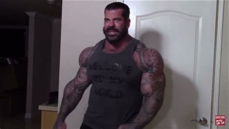 Rich Piana talking about tank tops and shoes .